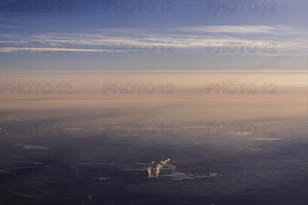 View of the Jaenschwalde coal-fired power plant from an aeroplane, taken near Jaenschwalde, 01.03.2023. According to the federal governments roadmap for phasing out coal, the last unit of the power pl...