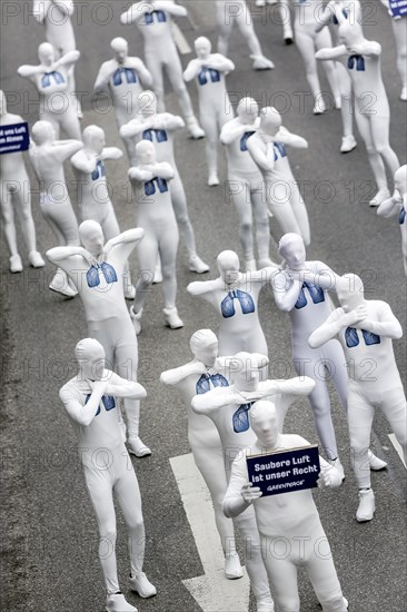 Protest of the environmental organisation Greenpeace, on the Bundesstrasse 14 40 activists demand better air quality, the Neckartor is considered the most polluted street in Germany with high levels o...