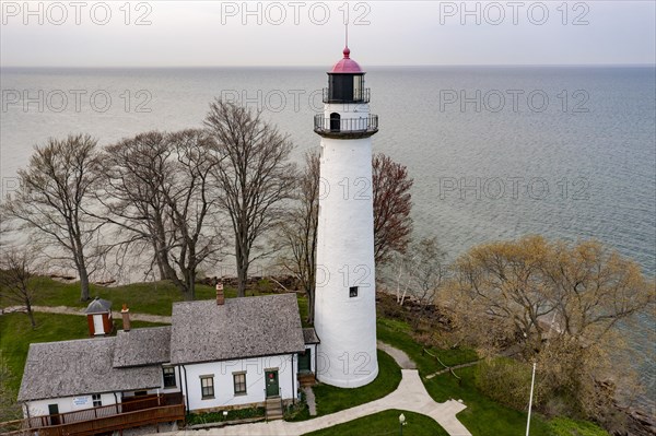 Port Hope, Michigan, The Pointe Aux Barques Lighthouse on Lake Huron. Built in 1857, it is one of the oldest continuously operating Lights on the Great Lakes. It replaced an earlier structure built in...
