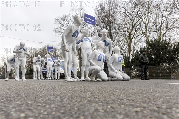 Protest of the environmental organisation Greenpeace, on the Bundesstrasse 14 40 activists demand better air quality, the Neckartor is considered the most polluted street in Germany with high levels o...