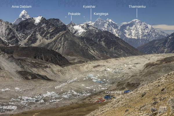 Mountain panorama seen from the trail leading toward the top of Kala Patthar above Gorakshep. The debris covered Khumbu Glacier is below and further down-valley are some six-thousands-plus peaks of th...
