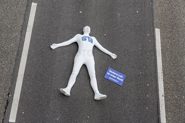 Protest of the environmental organisation Greenpeace, on the Bundesstrasse 14 40 activists demand better air quality, the Neckartor is considered the most polluted street in Germany with high levels o...