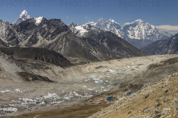 Mountain panorama seen from the trail leading toward the top of Kala Patthar above Gorakshep. The debris covered Khumbu Glacier is below and further down-valley are some six-thousands-plus peaks of th...