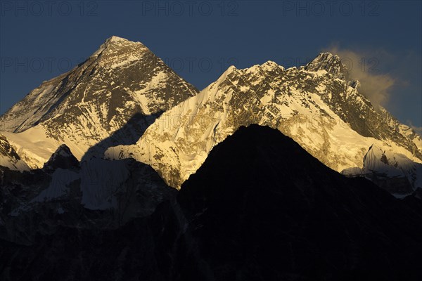 Mount Everest, Nuptse and Lhotse seen from Gokyo Ri at sunset. An autumn view. Gokyo Trek, Khumbu, the Everest Region, Himalayas. Sagarmatha National Park, a UNESCO World Heritage Site. Solukhumbu, Ne...