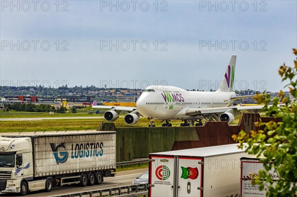 Boeing 747-400 cargo aircraft, taxiway, good infrastructure due to nearby motorway, Stuttgart Airport, Baden-Wuerttemberg, Germany, Europe