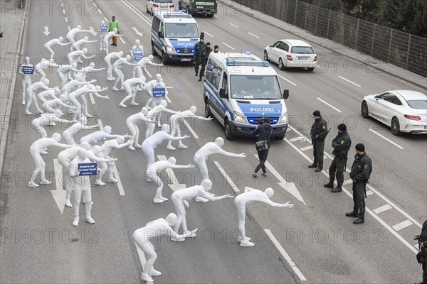 Protest of the environmental organisation Greenpeace, on the Bundesstrasse 14 40 activists demand better air quality, the Neckartor is considered the most polluted street in Germany with high levels o...