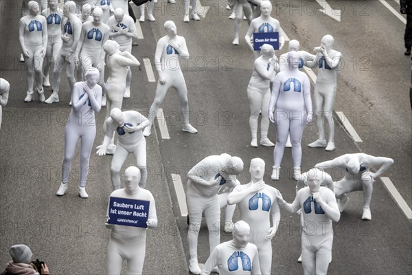 Protest of the environmental organisation Greenpeace, on the Bundesstrasse 14 40 activists demand better air quality, the Neckartor is considered the most polluted street in Germany with high levels o...