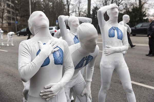 Protest of the environmental organisation Greenpeace, on the Bundesstrasse 14 40 activists demand better air quality, the Neckartor is considered the most polluted street in Germany with high levels o...