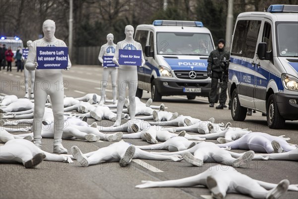 Protest of the environmental organisation Greenpeace, on the Bundesstrasse 14 40 activists demand better air quality, the Neckartor is considered the most polluted street in Germany with high levels o...