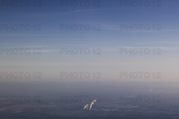 View of the Jaenschwalde coal-fired power plant from an aeroplane, taken near Jaenschwalde, 01.03.2023. According to the federal governments roadmap for phasing out coal, the last unit of the power pl...