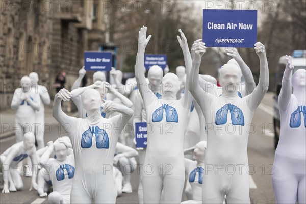 Protest of the environmental organisation Greenpeace, on the Bundesstrasse 14 40 activists demand better air quality, the Neckartor is considered the most polluted street in Germany with high levels o...