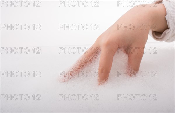 Hand washing and soap foam on a foamy background