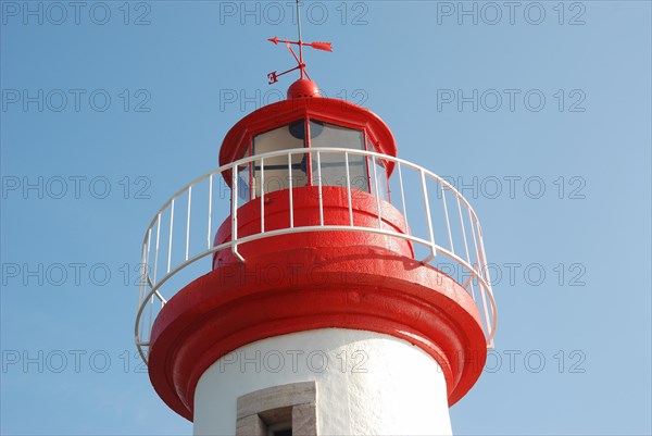 Lighthouse on a blue sky