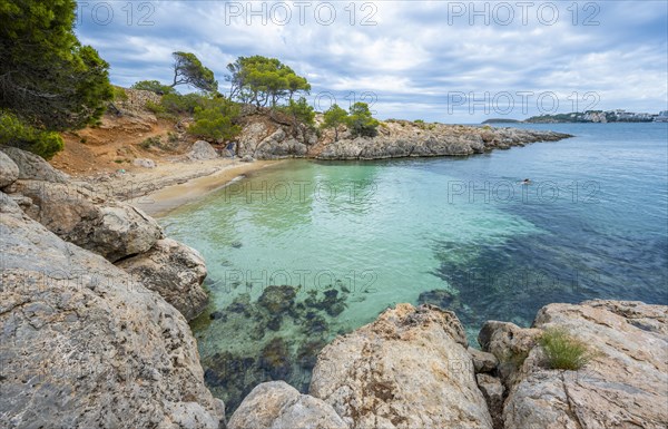 Small bay with sandy beach and blue sea