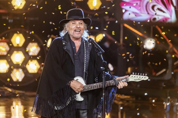 Singer Danyel Gerard performing on stage. 50 years of ZDF Hitparade