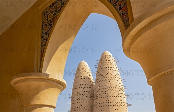 View of Pigeon Towers through the arcade arch of mosque