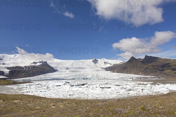 View over the glacier lake Fjallsarlon and Icelandic glacier Fjallsjoekull