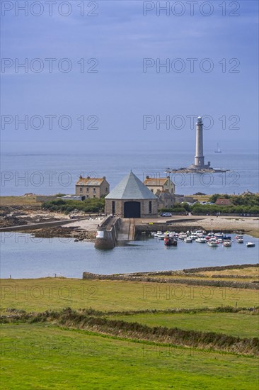 Phare de Goury lighthouse and lifeboat station in the port near Auderville at the Cap de La Hague