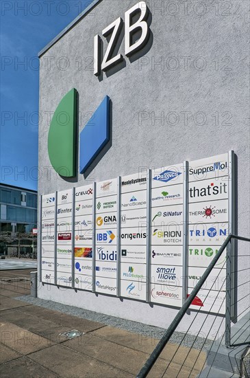 Information board with logos at the development company IZB mbH