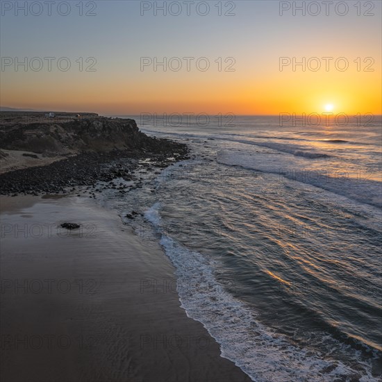 Sunset by the sea