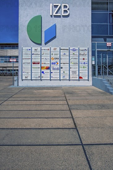 Information board with logos at the development company IZB mbH