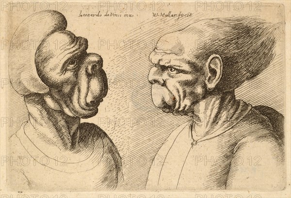 Two inward facing deformed heads