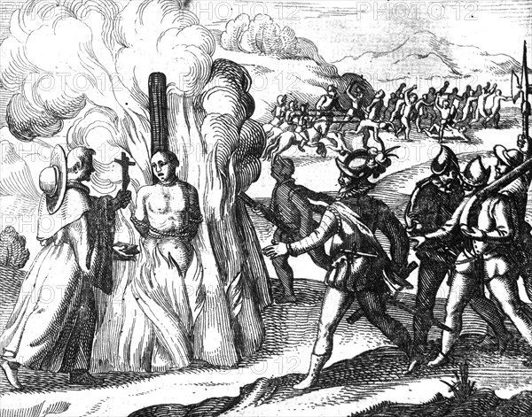 The Spaniards burn a man at the stake. A member of the clergy or priest holds out a Bible and a crucifix to the man who is to be burned or tortured. Spaniards on horseback pursuing Native Americans in...