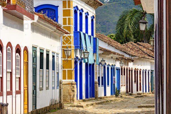 Streets of cobblestone and old houses in colonial style on the streets of the old and historic city of Paraty founded in the 17th century on the coast of the state of Rio de Janeiro