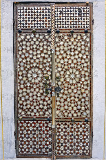 Portal with wood and mother-of-pearl mosaic inside the ancient and famous Topkapi Palace in Istanbul
