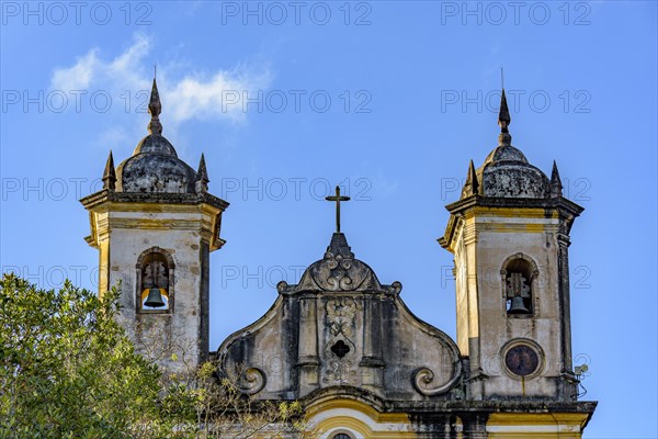 Baroque style historic church towers with their bells in Ouro Preto