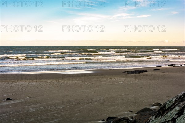 Beach in the city of Torres on the coast of the state of Rio Grande do Sul in Brazil during sunset