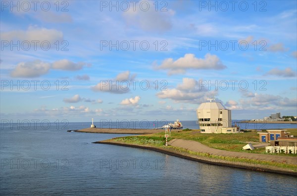 Part of harbor with ocean at Den Helder in the Netherlands on summer day
