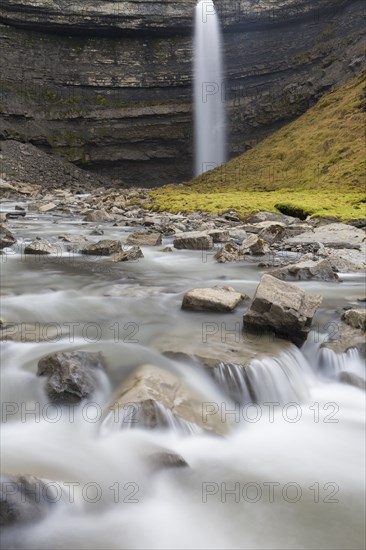Waterfall Hemsilfossen on the Hemsil river at Ekmanfjorden