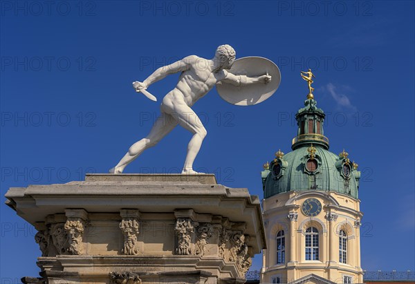 Statue of naked warriors in front of the main entrance to Charlottenburg Palace