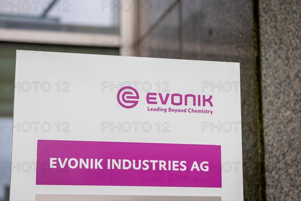 A sign of the evonik company at their headquarters in Essen
