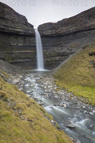 Waterfall Hemsilfossen on the Hemsil river at Ekmanfjorden
