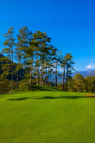 Putting Green on Golf Course Menaggio with Mountain View in Autumn in Lombardy