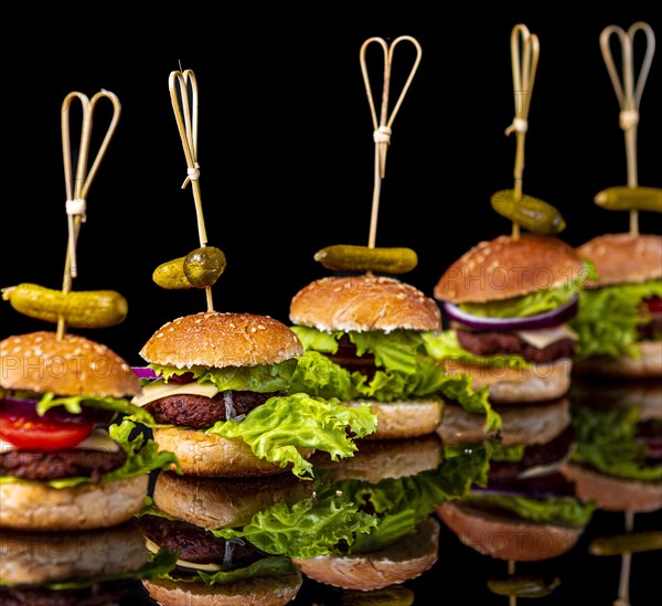 Small vegetarian hamburgers in a row