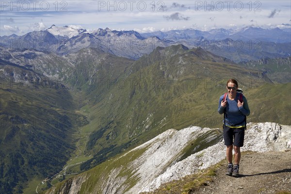 Woman on the summit of the Weisseck