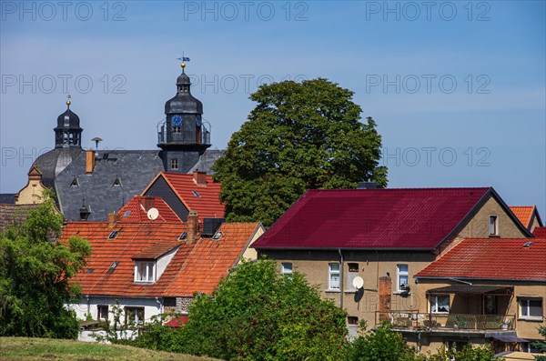 Historic town hall from 1900 and town hall tower as well as individual houses