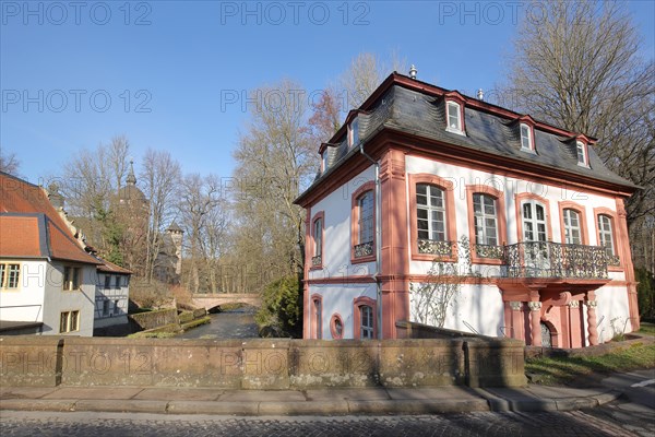 Building at Fuerstenau Castle with bridge over the Muemling stream