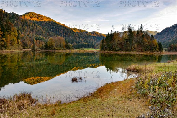 The Weitsee lake in the Chiemgau Alps nature reserve in autumn