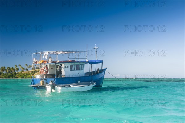 Fishing boat in the blue lagoon