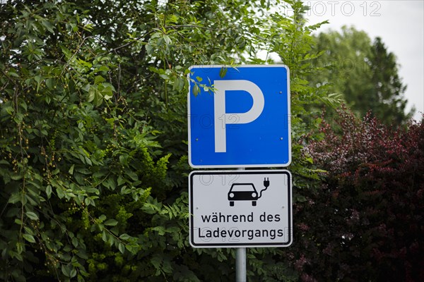 Free charging places at a charging station for electric vehicles in the green. Ummanz