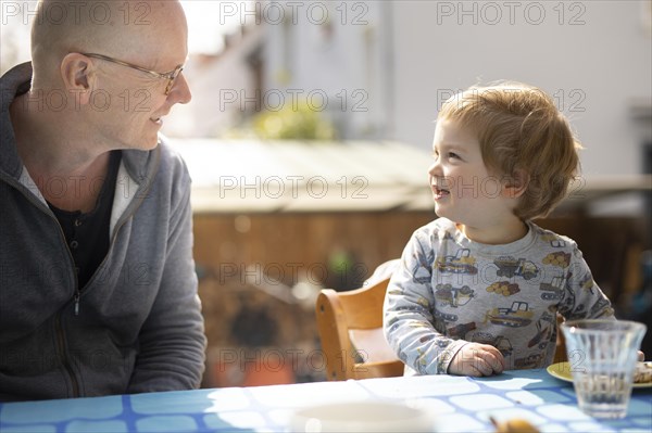 Topic: Grandpa talking to the grandchild. Communication