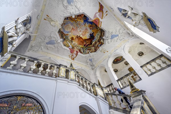 Staircase house with figures and ceiling fresco