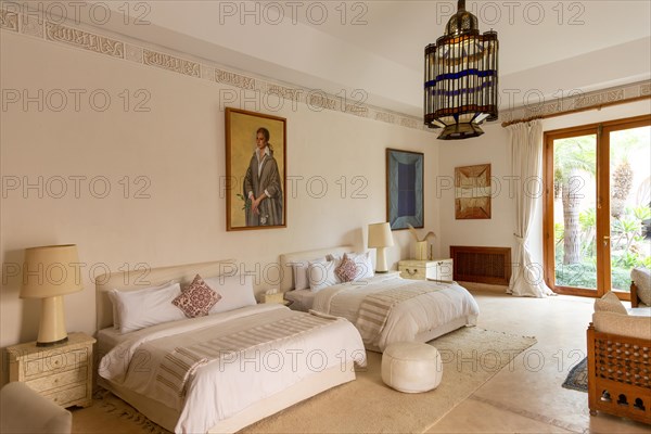 Bedroom with portrait of Farah Diba Pahlavi