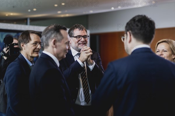 (L-R) Karl Lauterbach (SPD), Federal Minister of Health, Volker Wissing (FDP), Federal Minister of