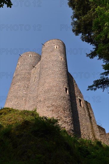 The medieval Spornburg Frauenburg in the Birkenfeld district in the morning light