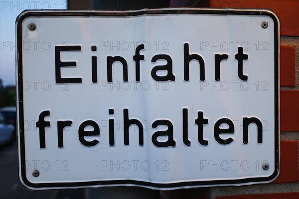 Sign with inscription Keep driveway clear